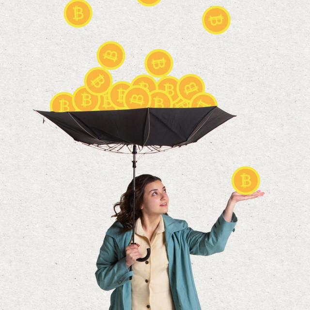 &lt;p&gt;Young woman in retro style attire with umbrella standing under bitcoin rain. Surrealism. Concept of earning, saving and investing money. Crypto currency, business, finance&lt;/p&gt;
